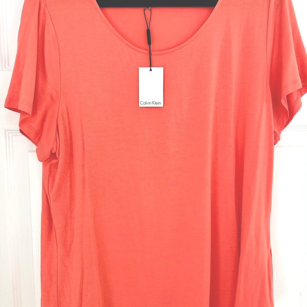 Brand new with tags XL Calvin Klein soft coral women’s short sleeve top